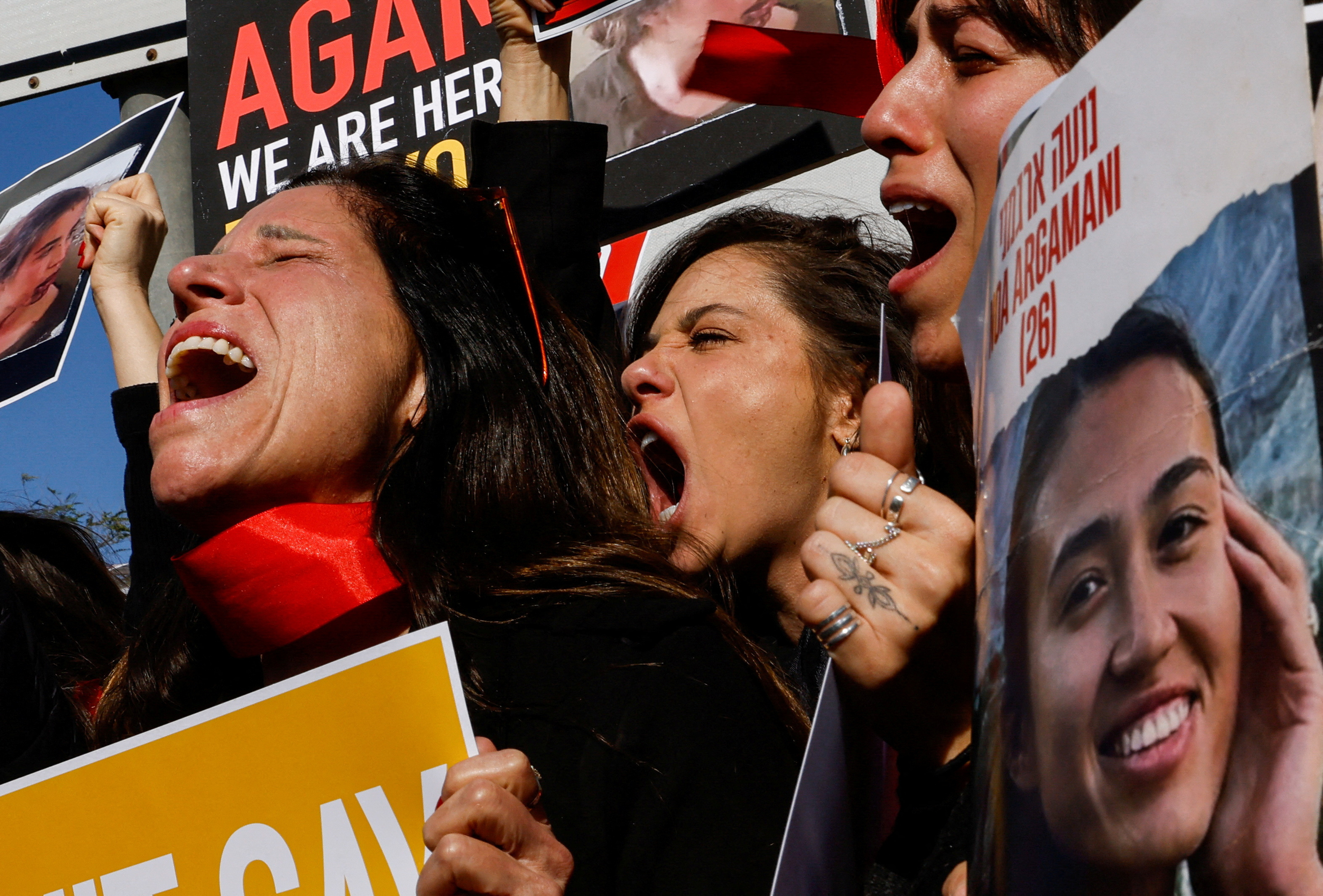 People take part in a protest in support of the release and protection of hostages held in Gaza, near Urim