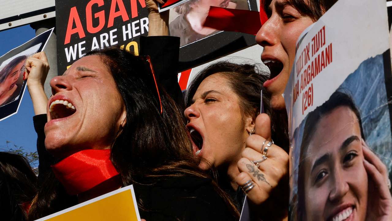 People take part in a protest in support of the release and protection of hostages held in Gaza, near Urim