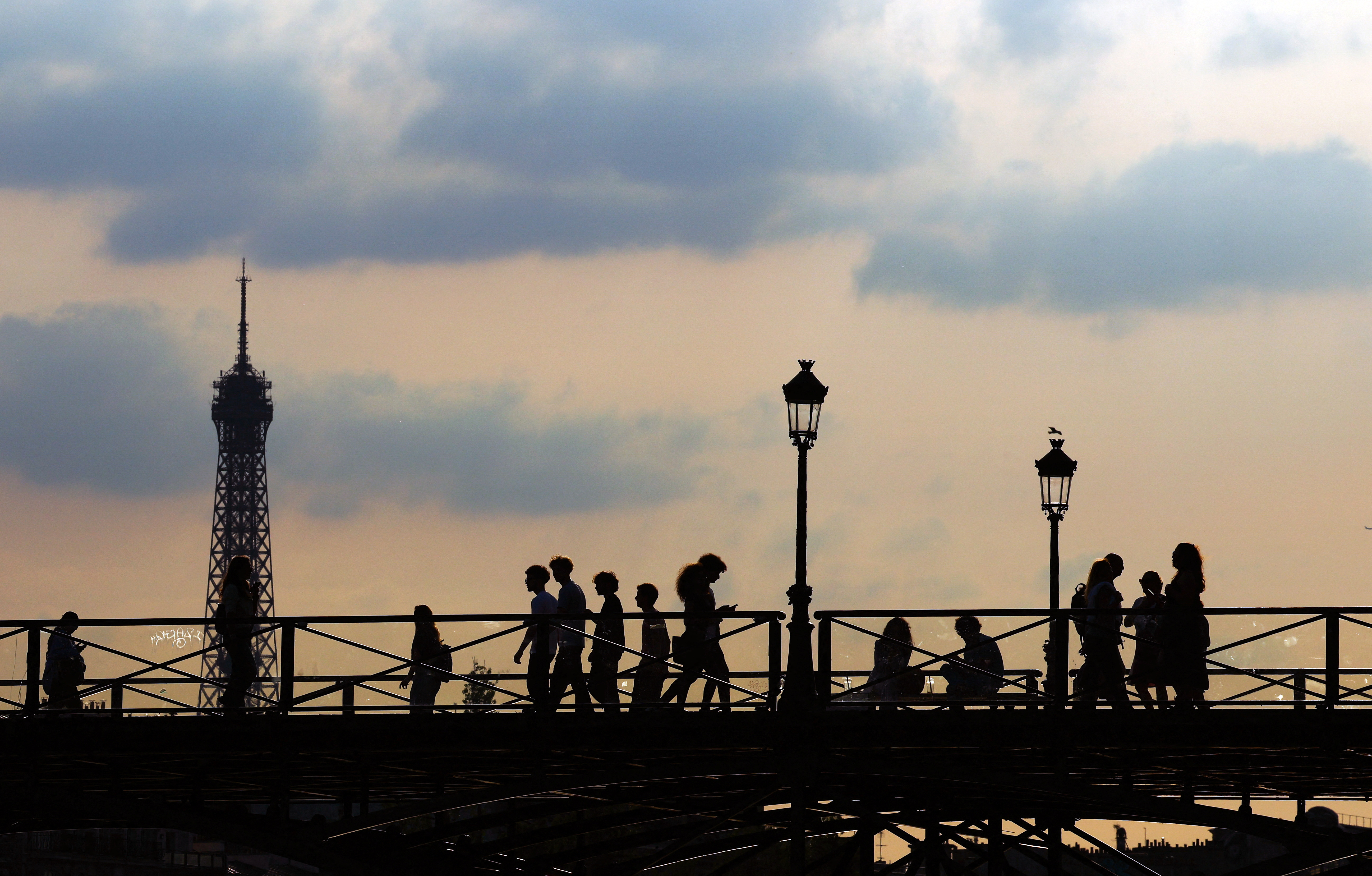 The Pont des Arts bridge and the Eiffel Tower in Paris
