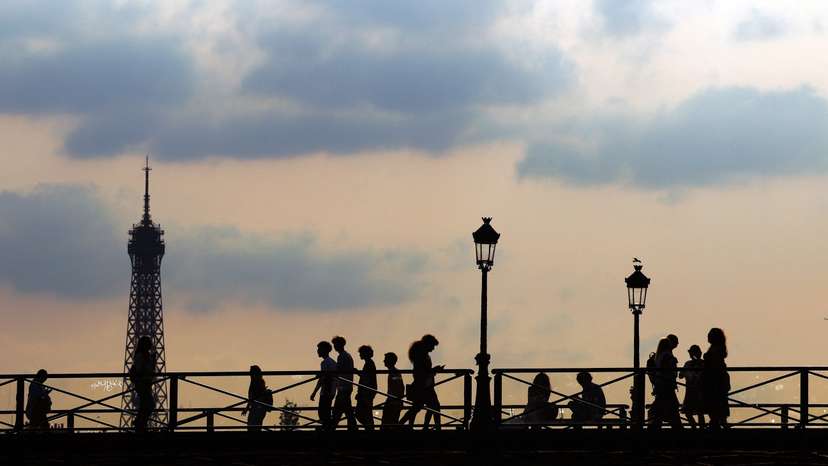 The Pont des Arts bridge and the Eiffel Tower in Paris