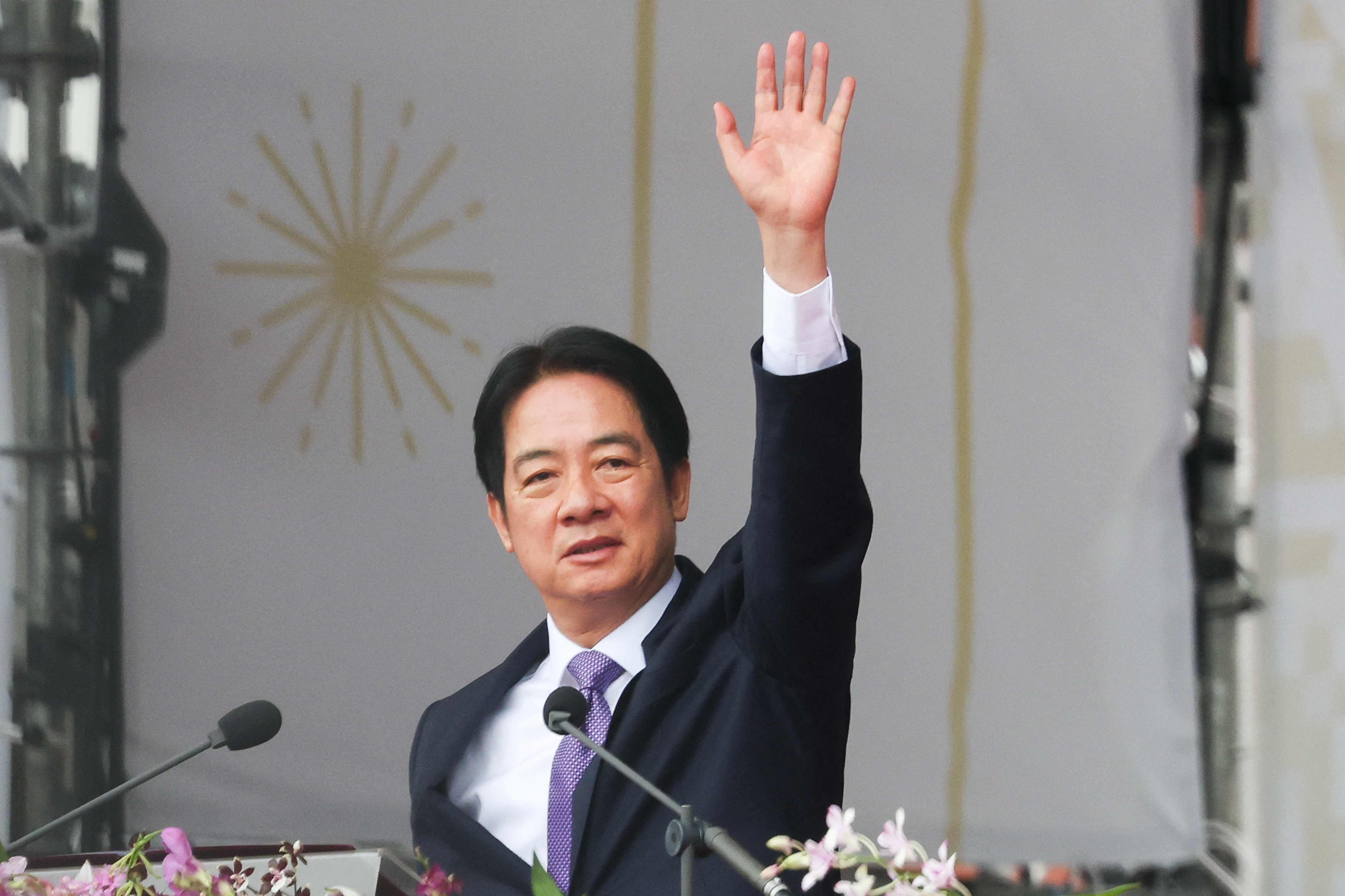 Taiwan President Lai Ching-te waves to the crowd on national day to mark the 113th birthday of the Republic of China, Taiwan's formal name