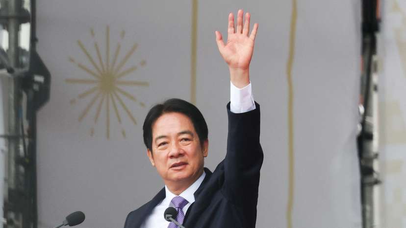 Taiwan President Lai Ching-te waves to the crowd on national day to mark the 113th birthday of the Republic of China, Taiwan's formal name