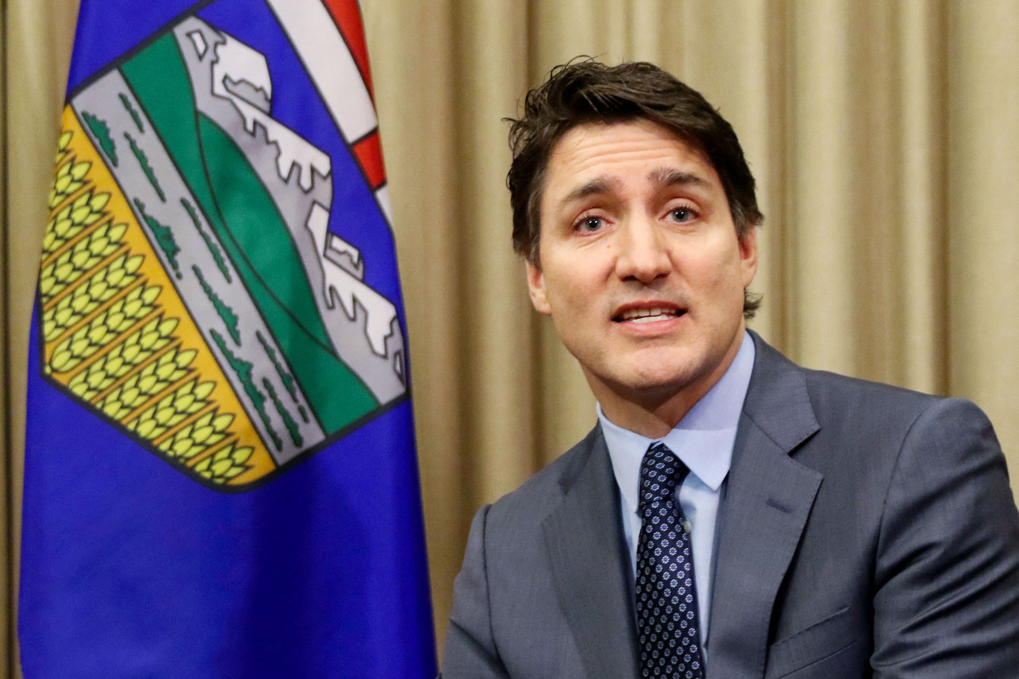 FILE PHOTO: Canada's PM Trudeau meets Alberta Premier Smith, in Calgary