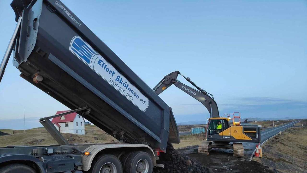 Streetwork is going on after cracks emerged on a road due to volcanic activity near Grindavik