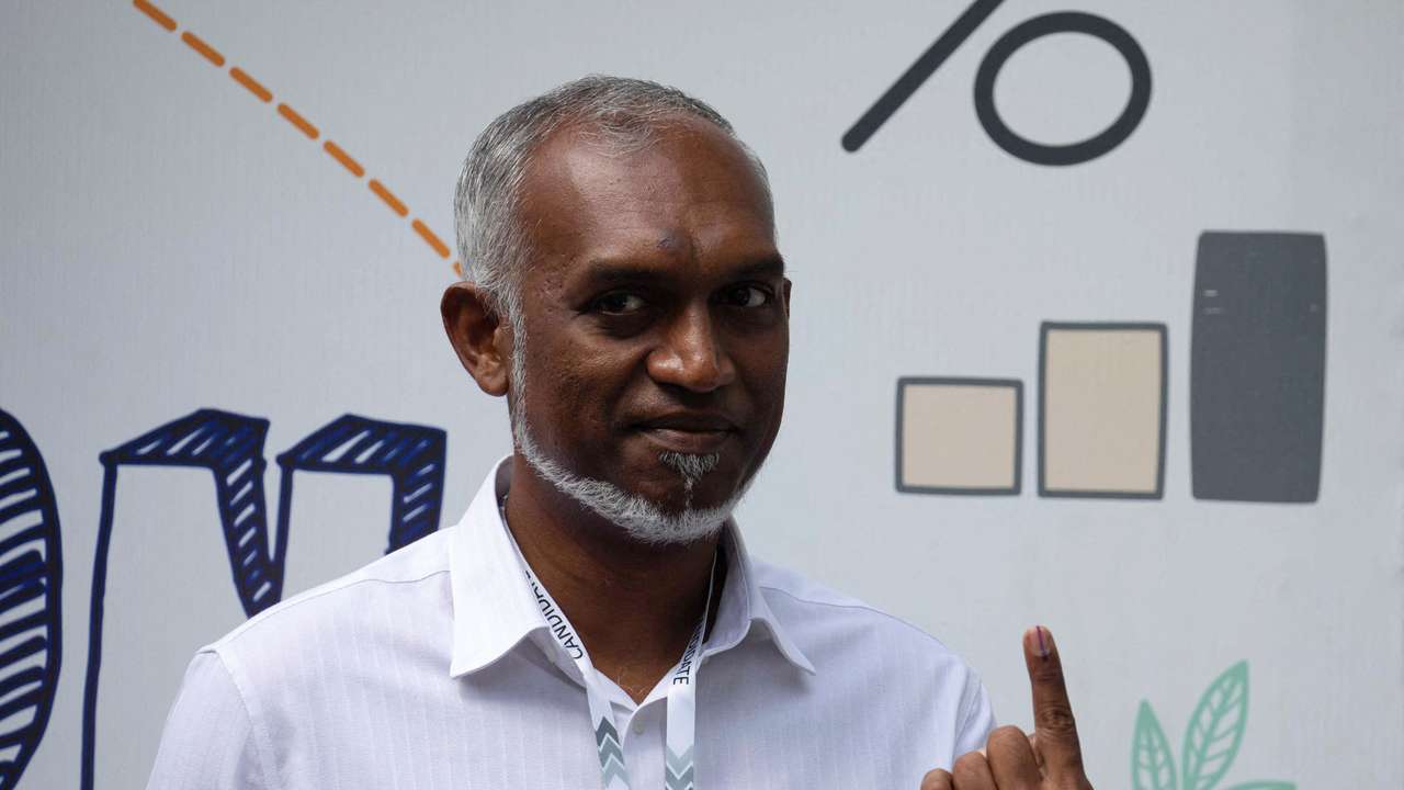 FILE PHOTO: Mohamed Muizzu, Maldives presidential candidate of the opposition party, People's National Congress gestures after casting his vote at a polling station during the Maldives presidential election day in Male, Maldives September 9, 2023. REUTERS/Dhahau Naseem/File Photo