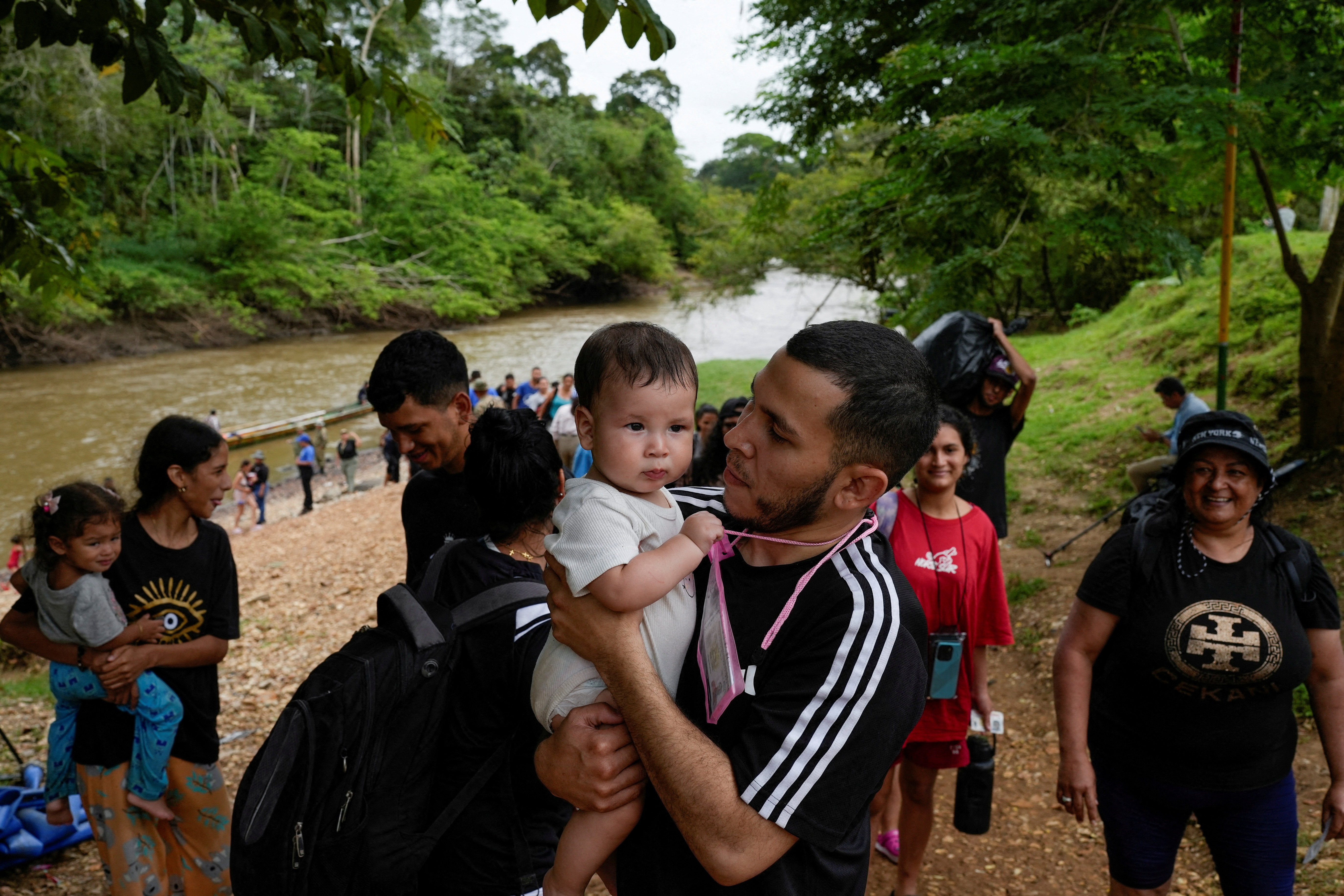FILE PHOTO: Migrants arrive to the migrant reception center, in Lajas Blancas