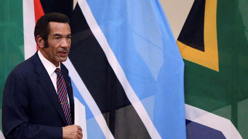 FILE PHOTO: Botswana's President Ian Khama returns to his seat after giving a speech during the Botswana-South Africa Bi-National Commission (BNC) in Pretoria