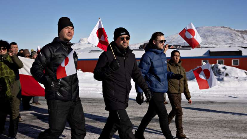 People protest under the slogan, "Greenland belongs to the Greenlandic people", in Nuuk