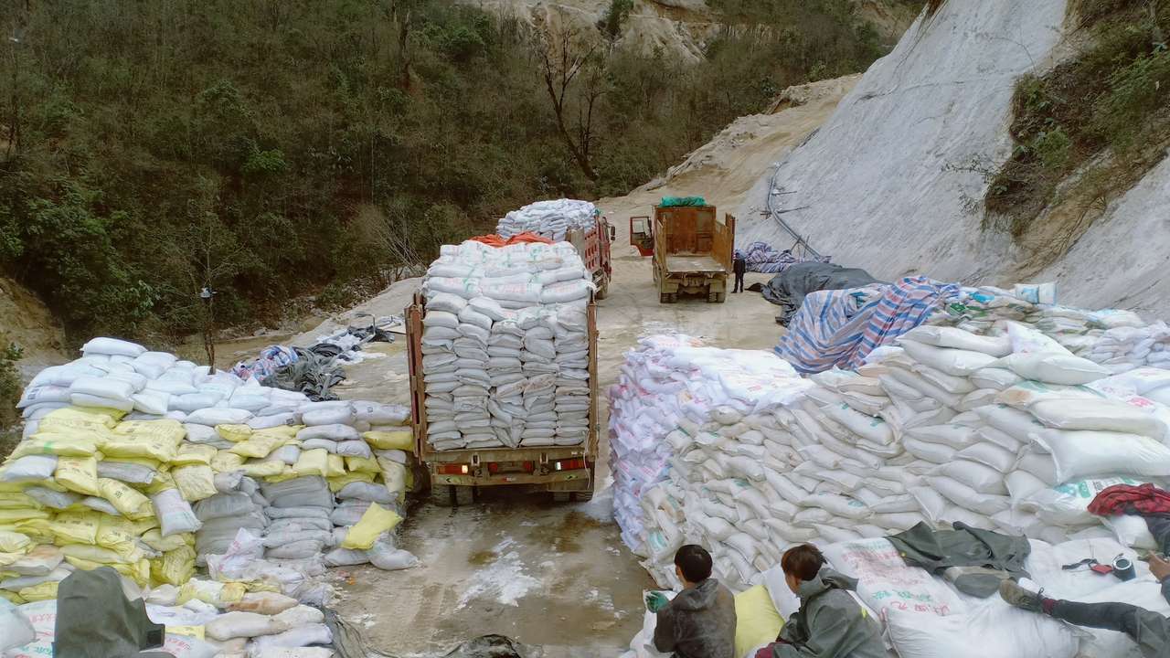 Labourers work on a rare earth mine in Kachin state