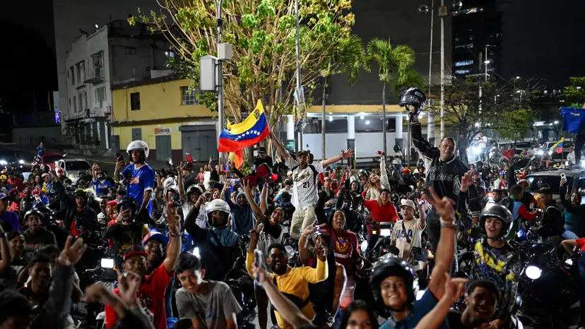 People celebrate Venezuela's victory over the U.S. in the World Baseball Classic final in Caracas