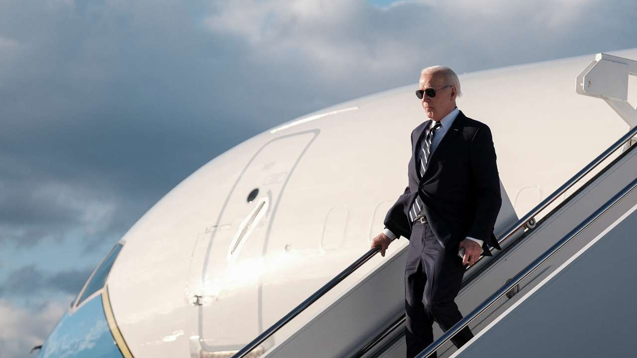 U.S. President Joe Biden disembarks from Air Force One at Dover Air Force Base, in Dover