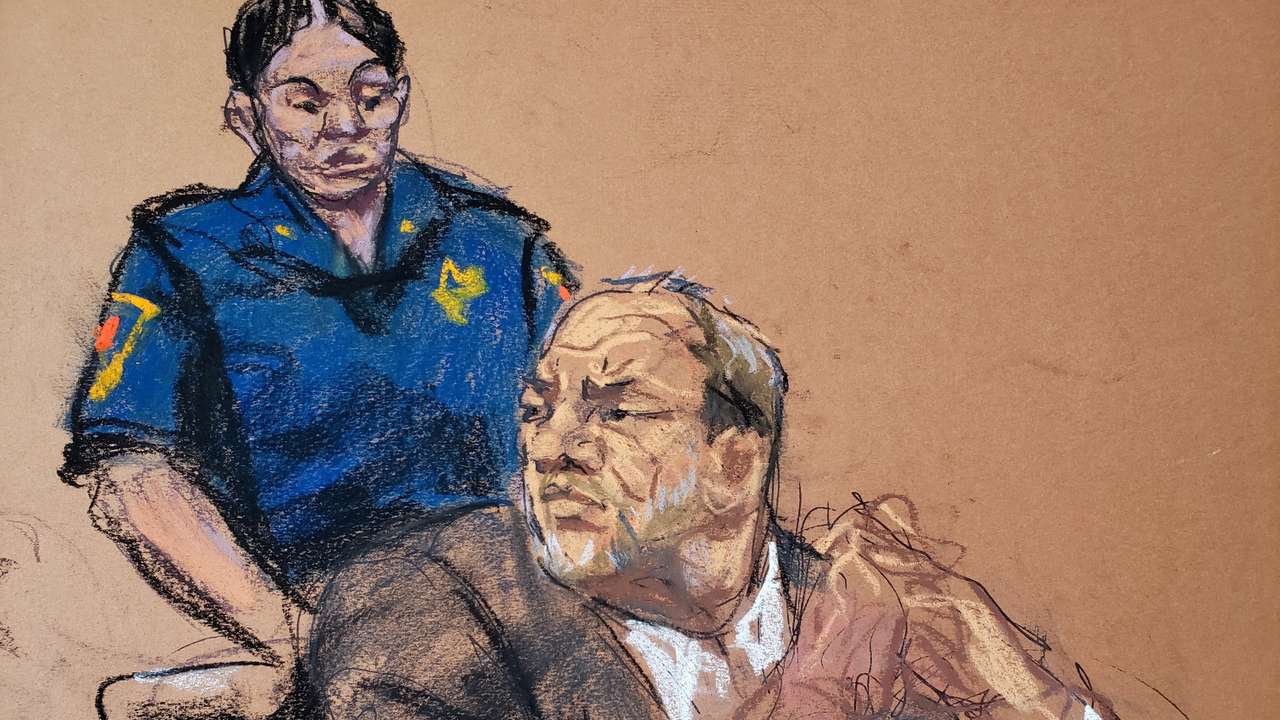 FILE PHOTO: Harvey Weinstein watches as Jessica Mann makes a statement during the sentencing following his conviction on sexual assault and rape charges