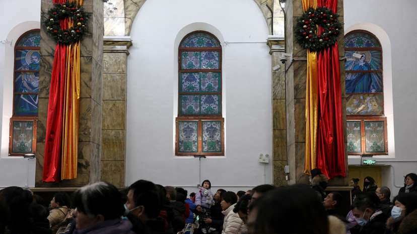 FILE PHOTO: Christmas Eve mass at Catholic church in Beijing