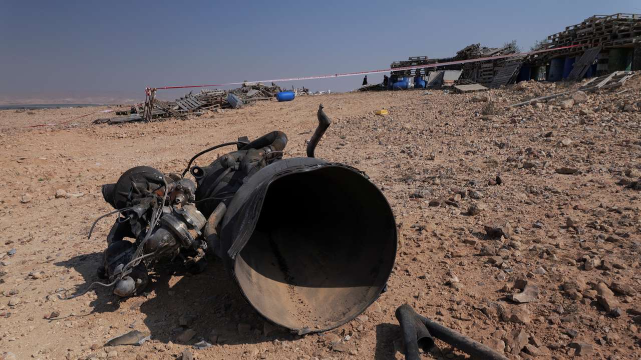 The remains of a rocket booster that, according to Israeli authorities critically injured a 7-year-old girl, after Iran launched drones and missiles towards Israel, near Arad