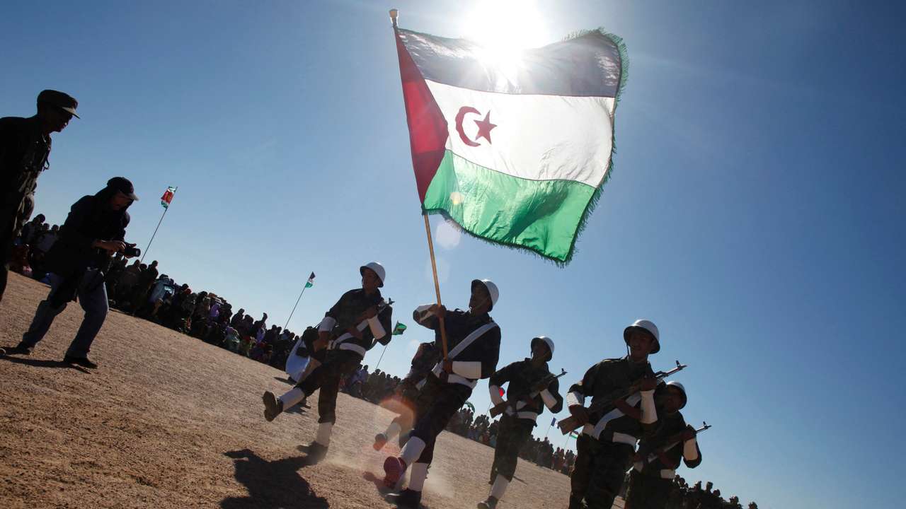 FILE PHOTO: Polisario Front soldiers parade during celebrations for the 35th anniversary of the group's independence movement for control of Western Sahara from Morocco