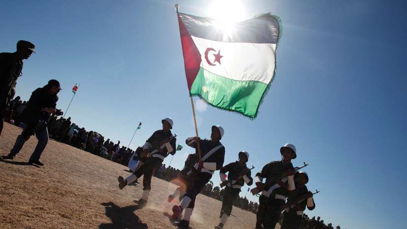 FILE PHOTO: Polisario Front soldiers parade during celebrations for the 35th anniversary of the group's independence movement for control of Western Sahara from Morocco
