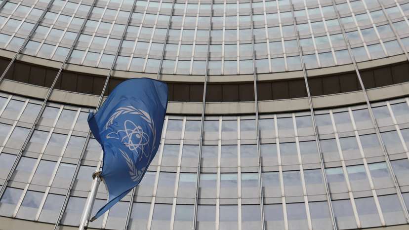 IAEA flag flutters in front of its headquarters in Vienna