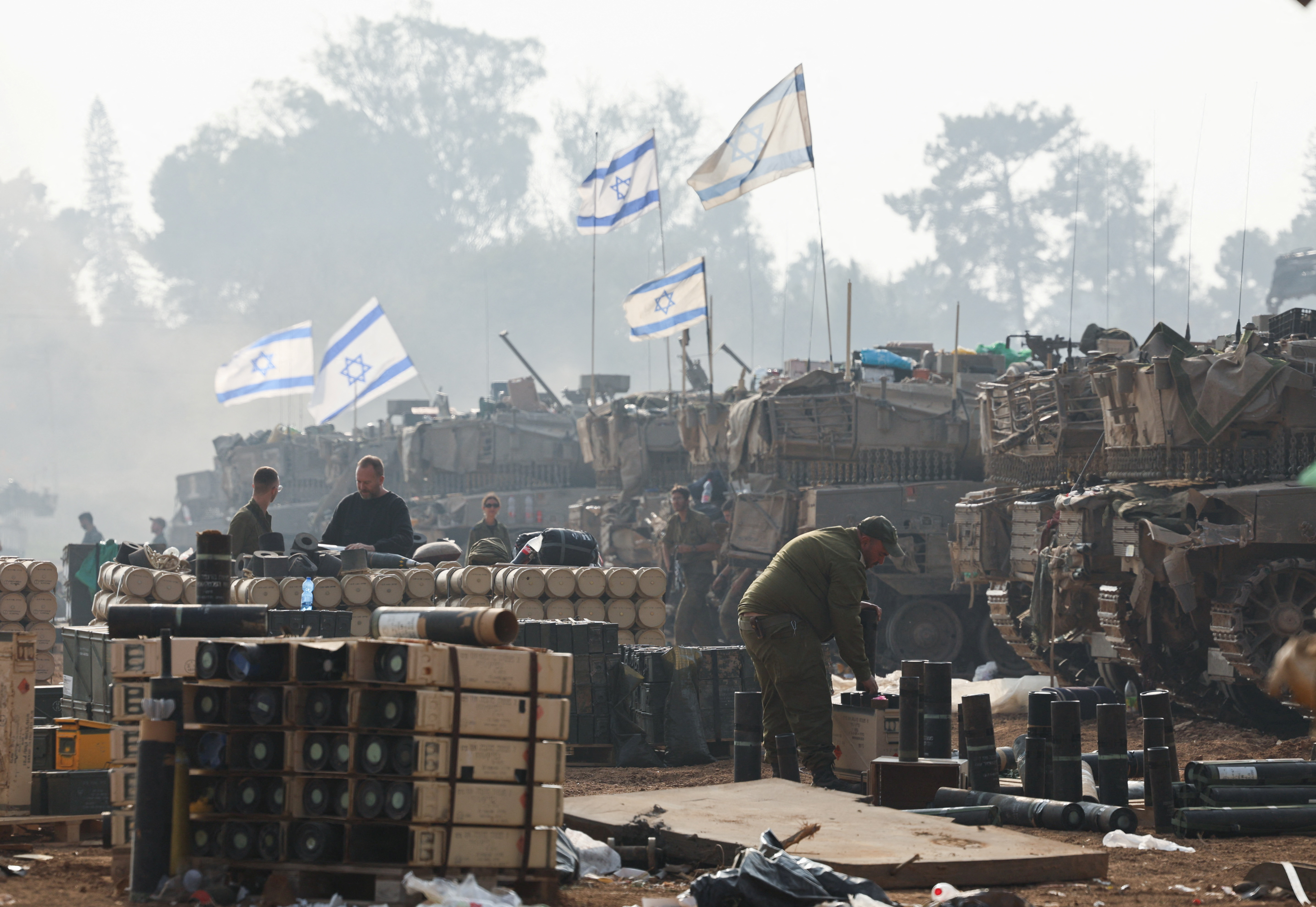 An Israeli soldier handles ammunition, near the Israel-Gaza border