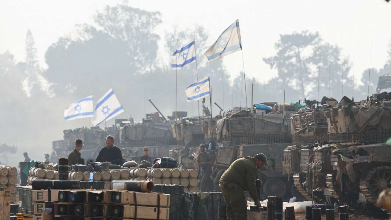 An Israeli soldier handles ammunition, near the Israel-Gaza border