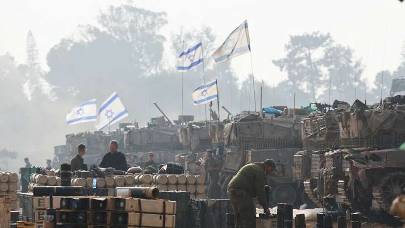 An Israeli soldier handles ammunition, near the Israel-Gaza border