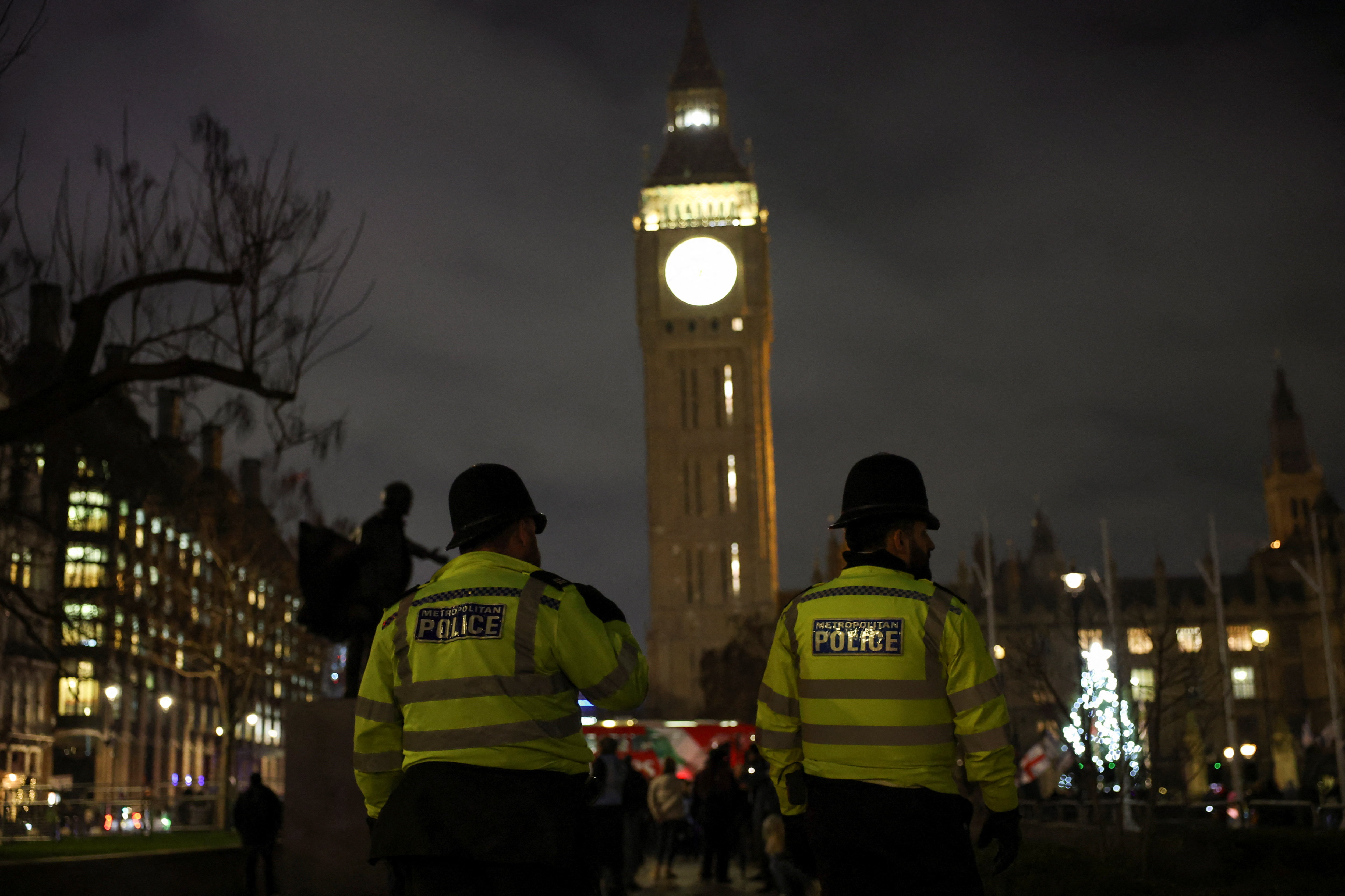 FILE PHOTO: People attend a vigil to honour victims of the Bondi attack in Sydney and mark the second night of Hanukkah, in London