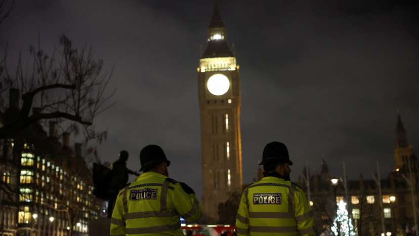 FILE PHOTO: People attend a vigil to honour victims of the Bondi attack in Sydney and mark the second night of Hanukkah, in London
