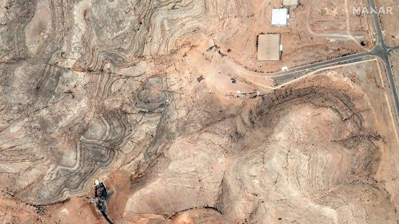 A satellite image shows damage to the tunnel entrances of the Isfahan Nuclear Technology Research Center