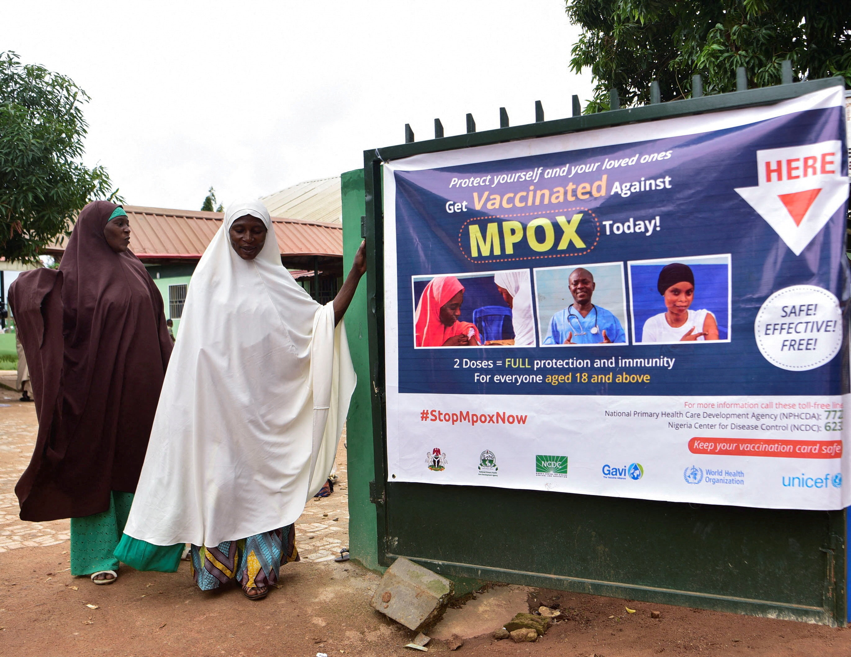 FILE PHOTO: People depart a Primary Health Care Center after receiving mpox vaccination, following the resurgence of mpox cases in Igabi