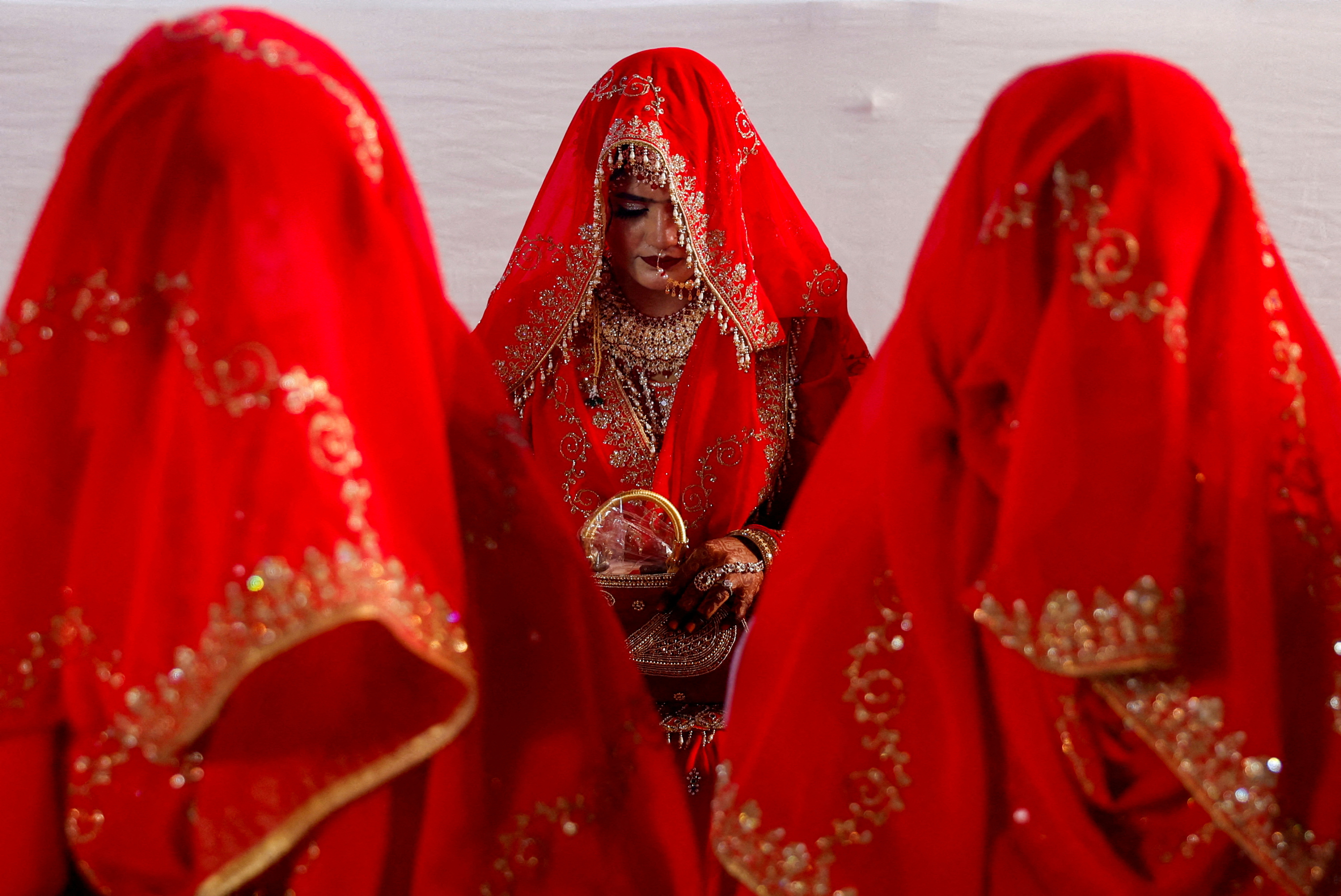 FILE PHOTO: Muslim women are seen during a mass marriage ceremony, in which, 51 Muslim couples took their wedding vows, in Mumbai