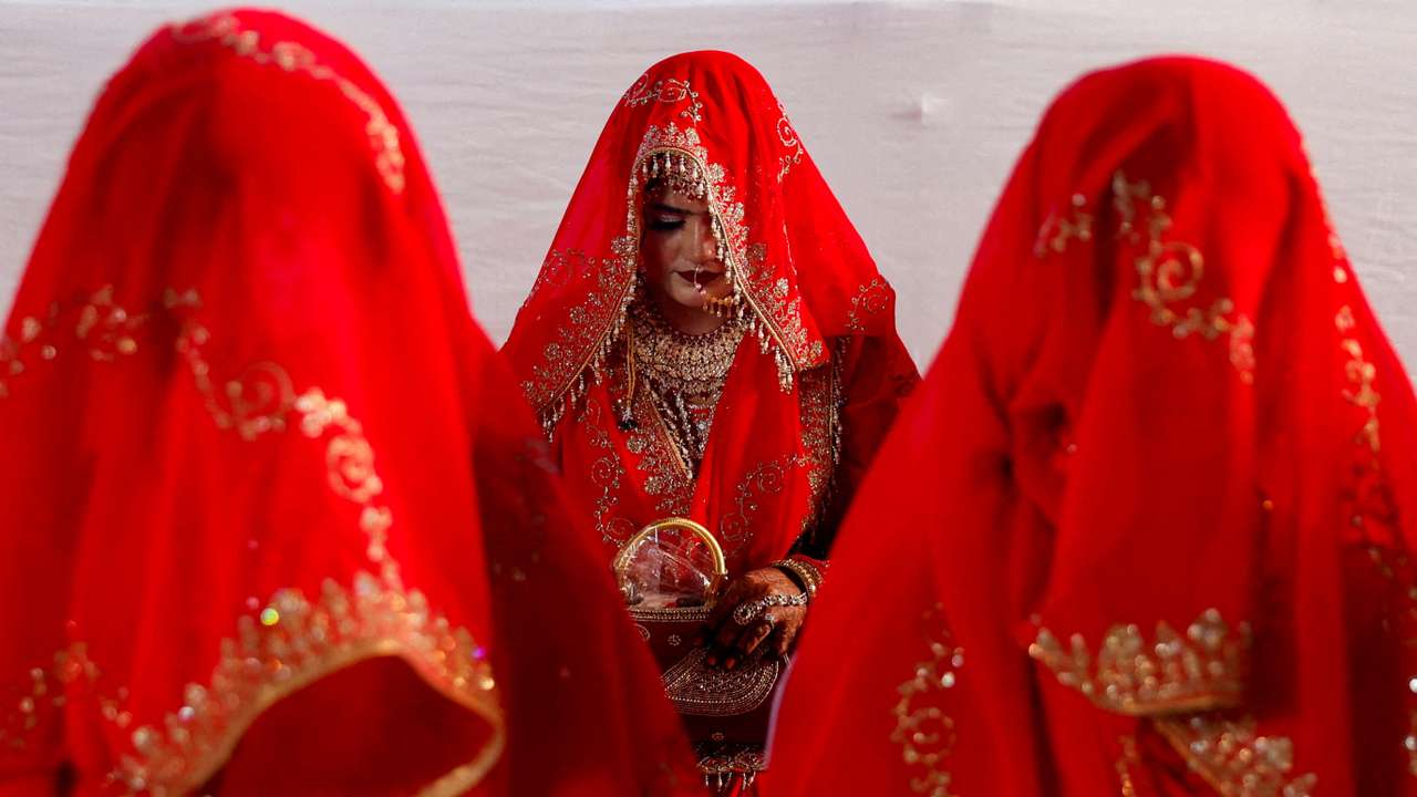 FILE PHOTO: Muslim women are seen during a mass marriage ceremony, in which, 51 Muslim couples took their wedding vows, in Mumbai