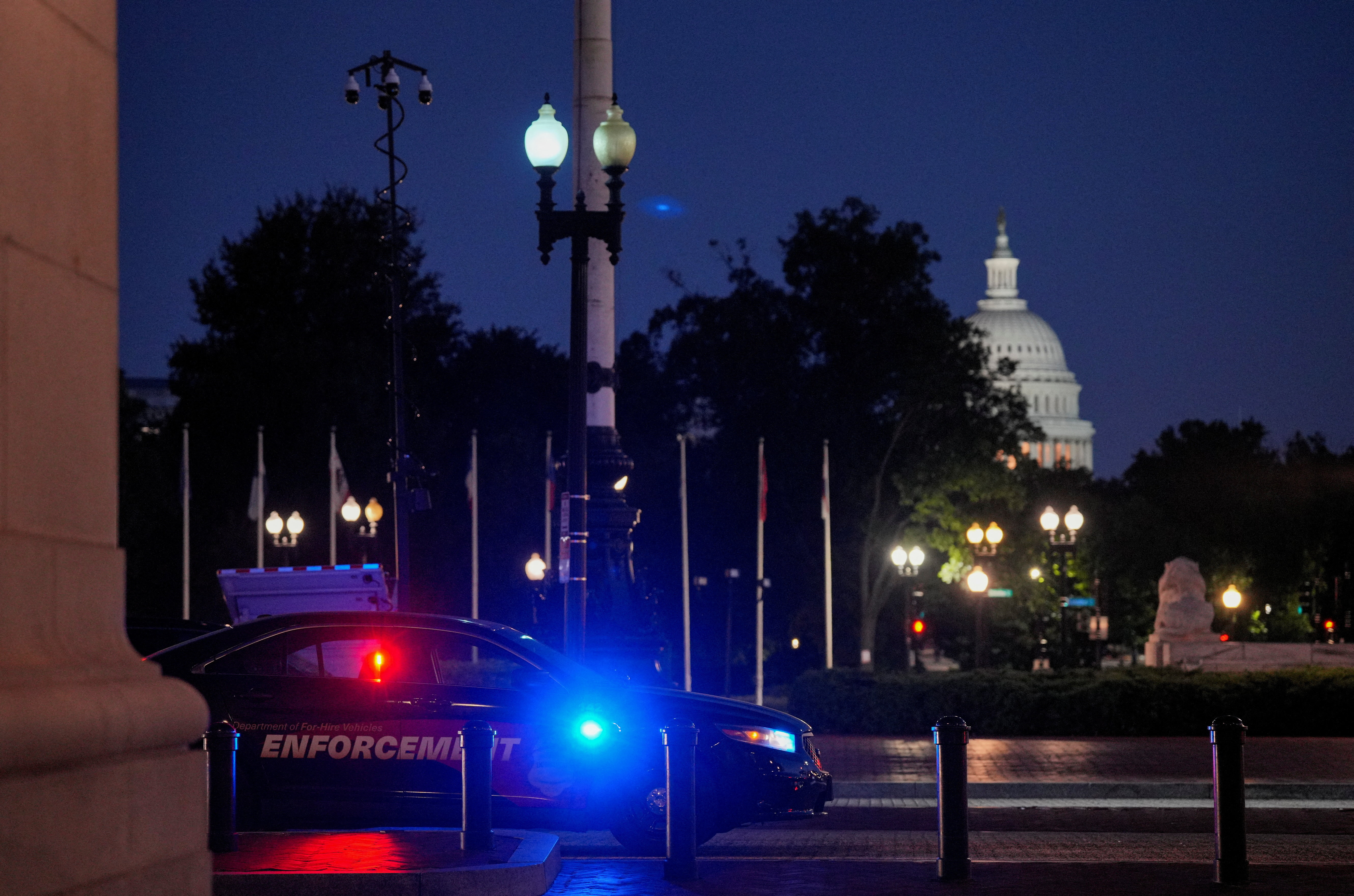 A law enforcement vehicle stands in front of Union Station near the U.S. Capitol in Washington