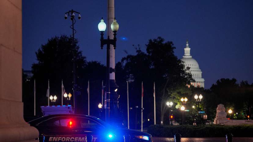 A law enforcement vehicle stands in front of Union Station near the U.S. Capitol in Washington