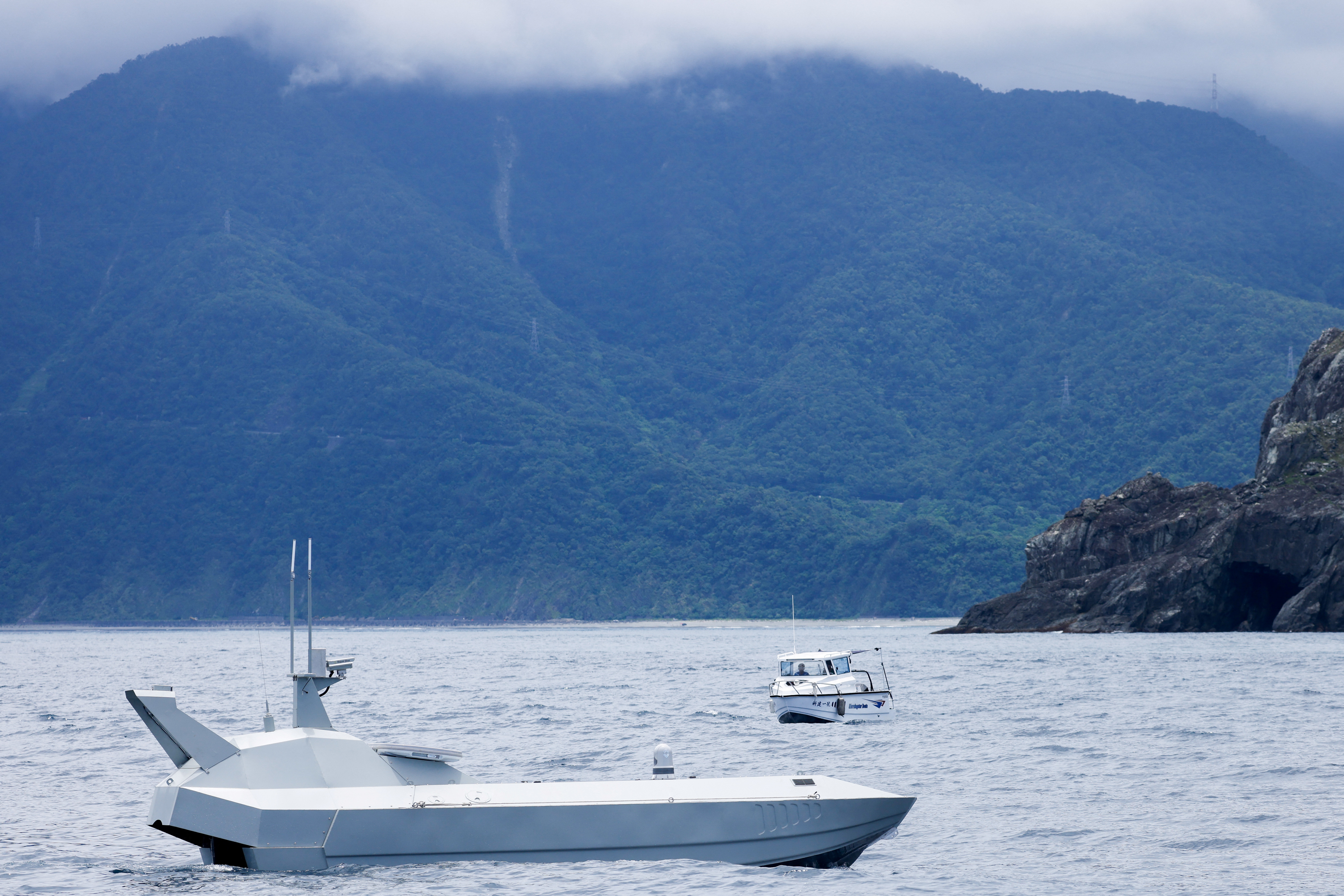 A SeaShark 800 sea drone, developed by Thunder Tiger, takes part in a test ride in the sea off Wushi