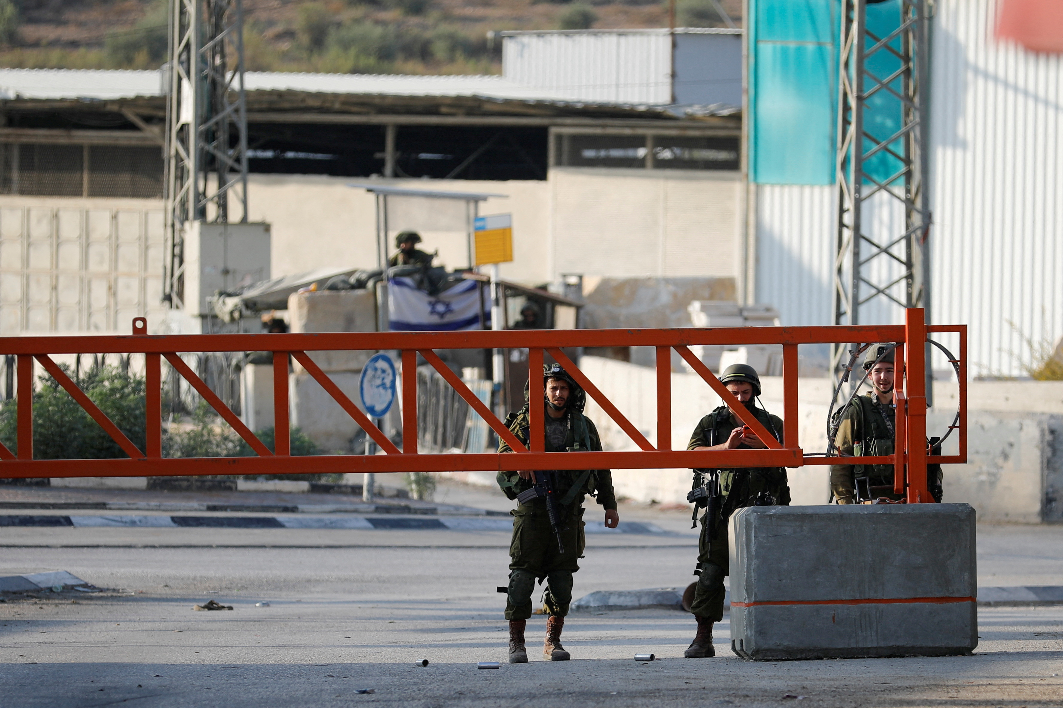 Palestinians clash with Israeli troops after settlers' attack in Deir Sharaf