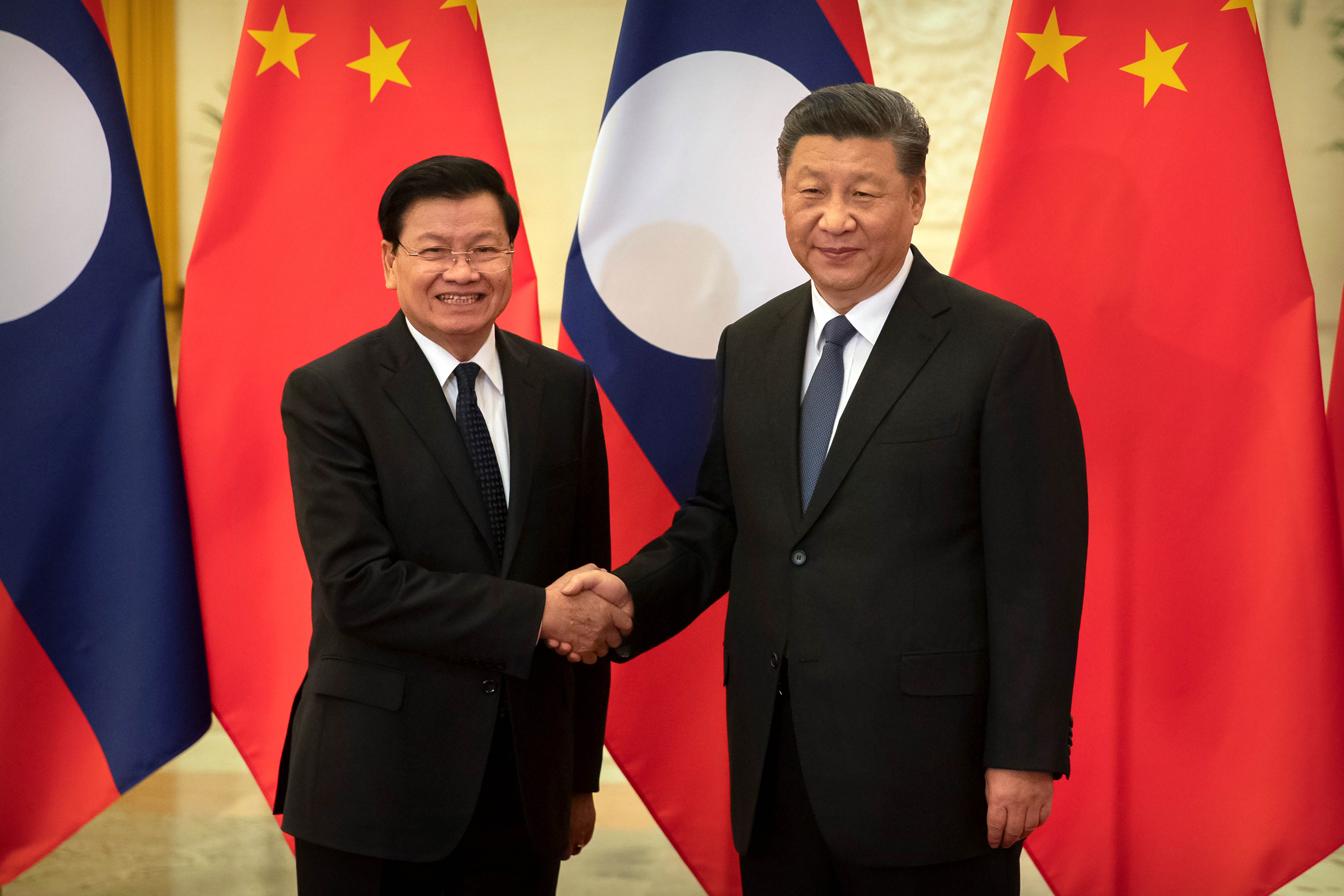 Laos' PM Thongloun Sisoulith and China's President Xi Jinping meet in Beijing
