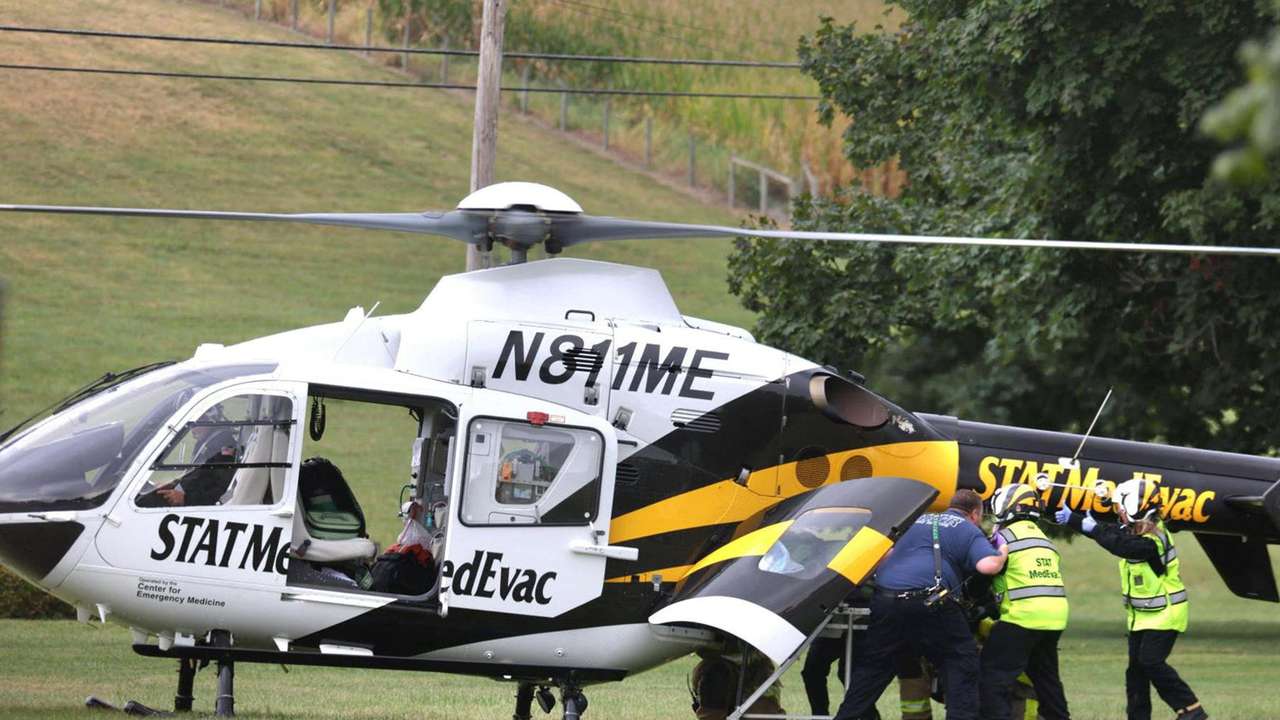 A police officer is loaded into a Medevac helicopter after a shooting incident in York County's North Codorus Township