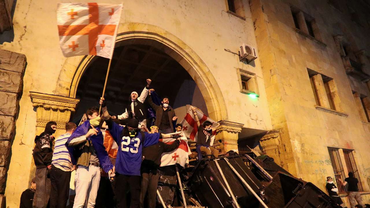 Demonstrators hold a rally to protest against a bill on "foreign agents", in Tbilisi