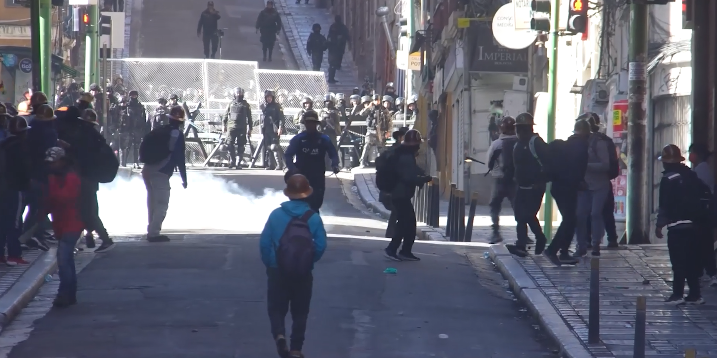 Bolivian miners clash with police while demanding president’s resignation