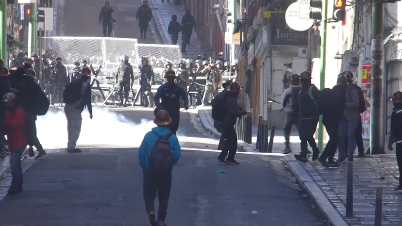Bolivian miners clash with police while demanding president’s resignation