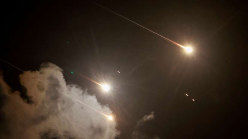 FILE PHOTO: Projectiles are seen in the sky after Iran fired a salvo of ballistic missiles, amid cross-border hostilities between Hezbollah and Israel, as seen from Tel Aviv