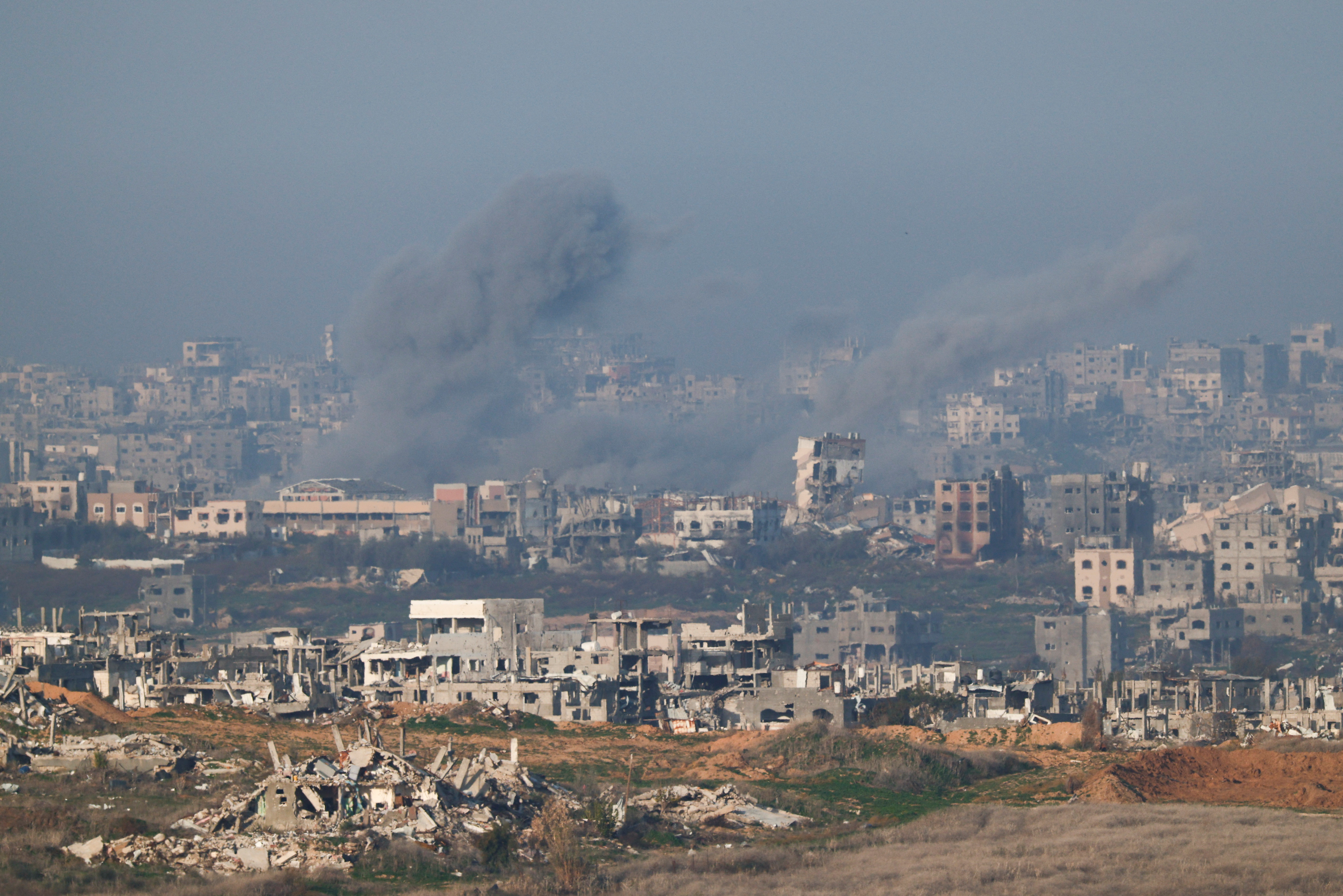 Smoke rises from the northern Gaza Strip as seen from the Israel side of the border, near Sderot