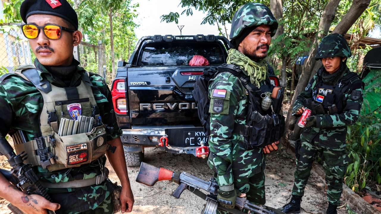 Soldiers from the Karen National Liberation Army (KNLA) prepare to patrol Myawaddy, the Thailand-Myanmar border town under the control of a coalition of rebel forces led by the Karen National Union