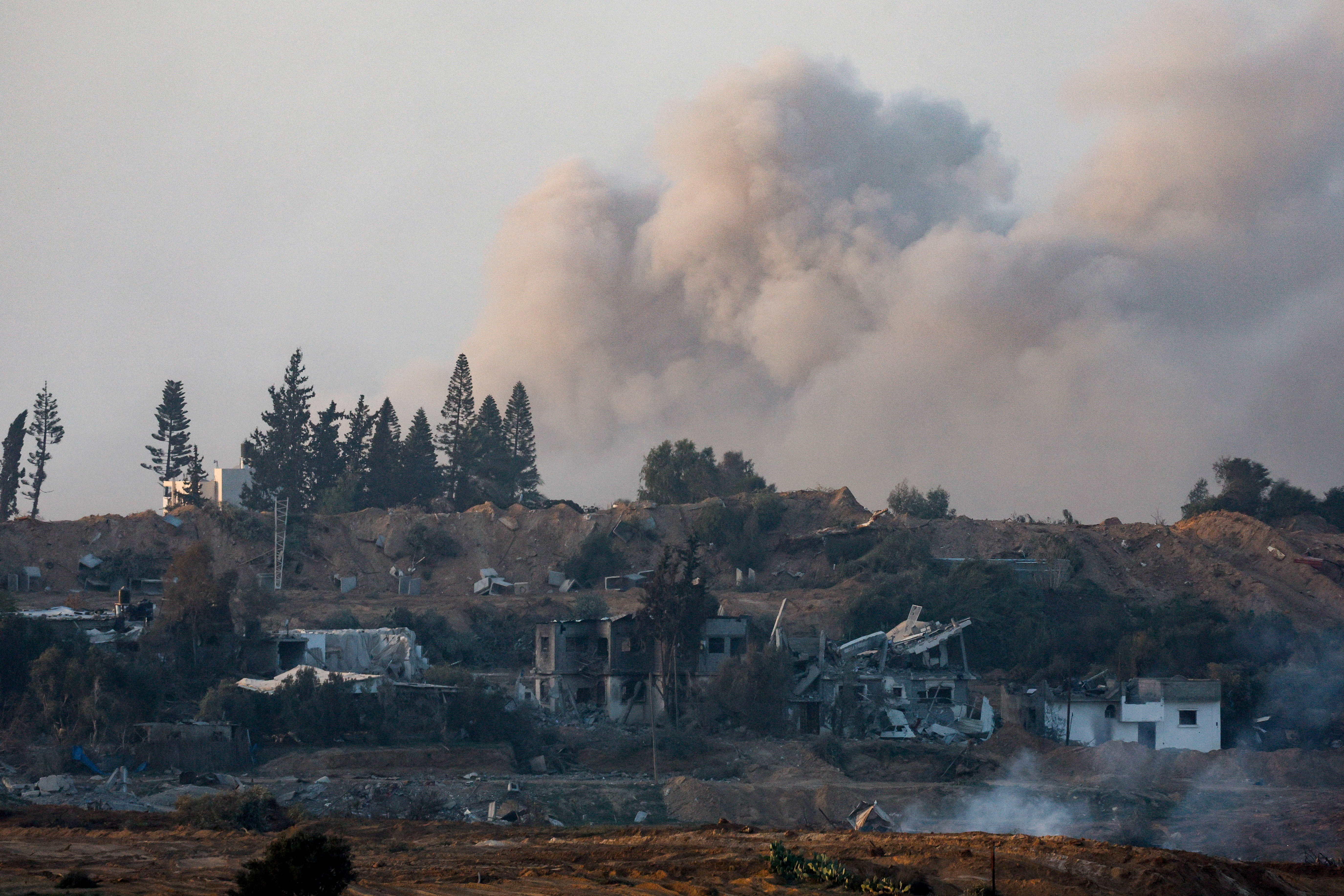 Smoke rises during an explosion in central Gaza