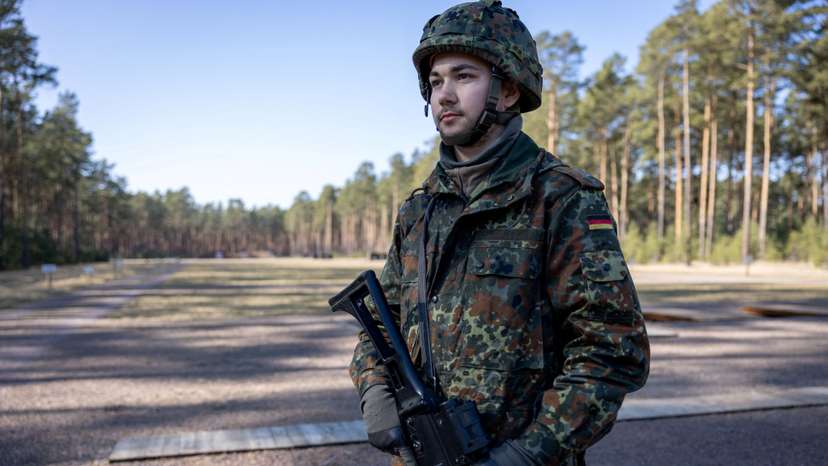 FILE PHOTO: German reservists undergo shooting training at barracks in Beelitz near Berlin, as NATO looks to boost its strength after Russia's invasion of Ukraine