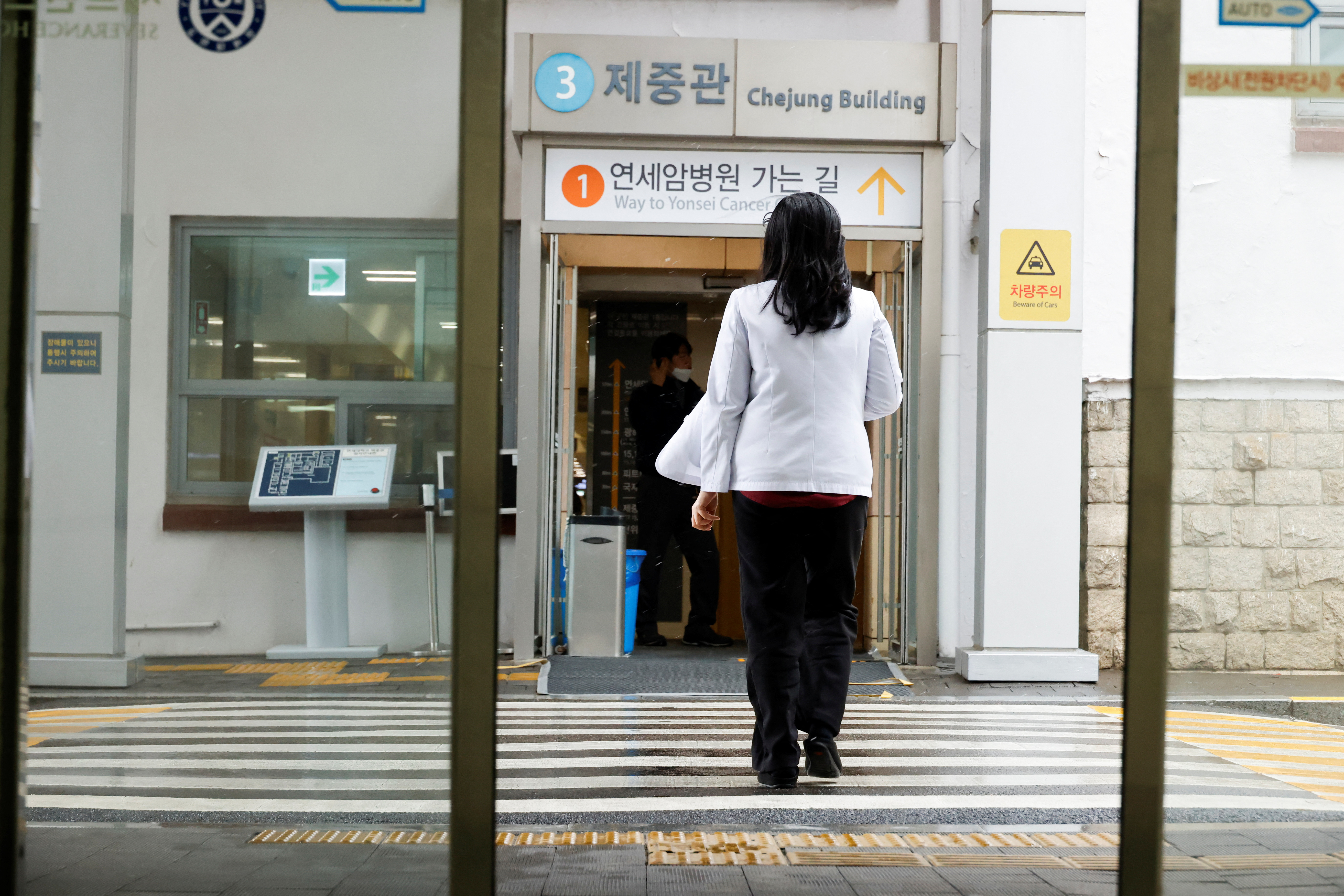 FILE PHOTO: A medical worker walks at Severance Hospital in Seoul