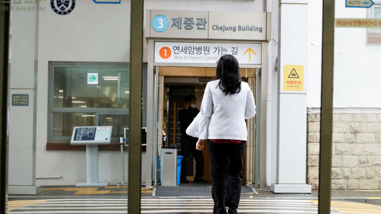 FILE PHOTO: A medical worker walks at Severance Hospital in Seoul