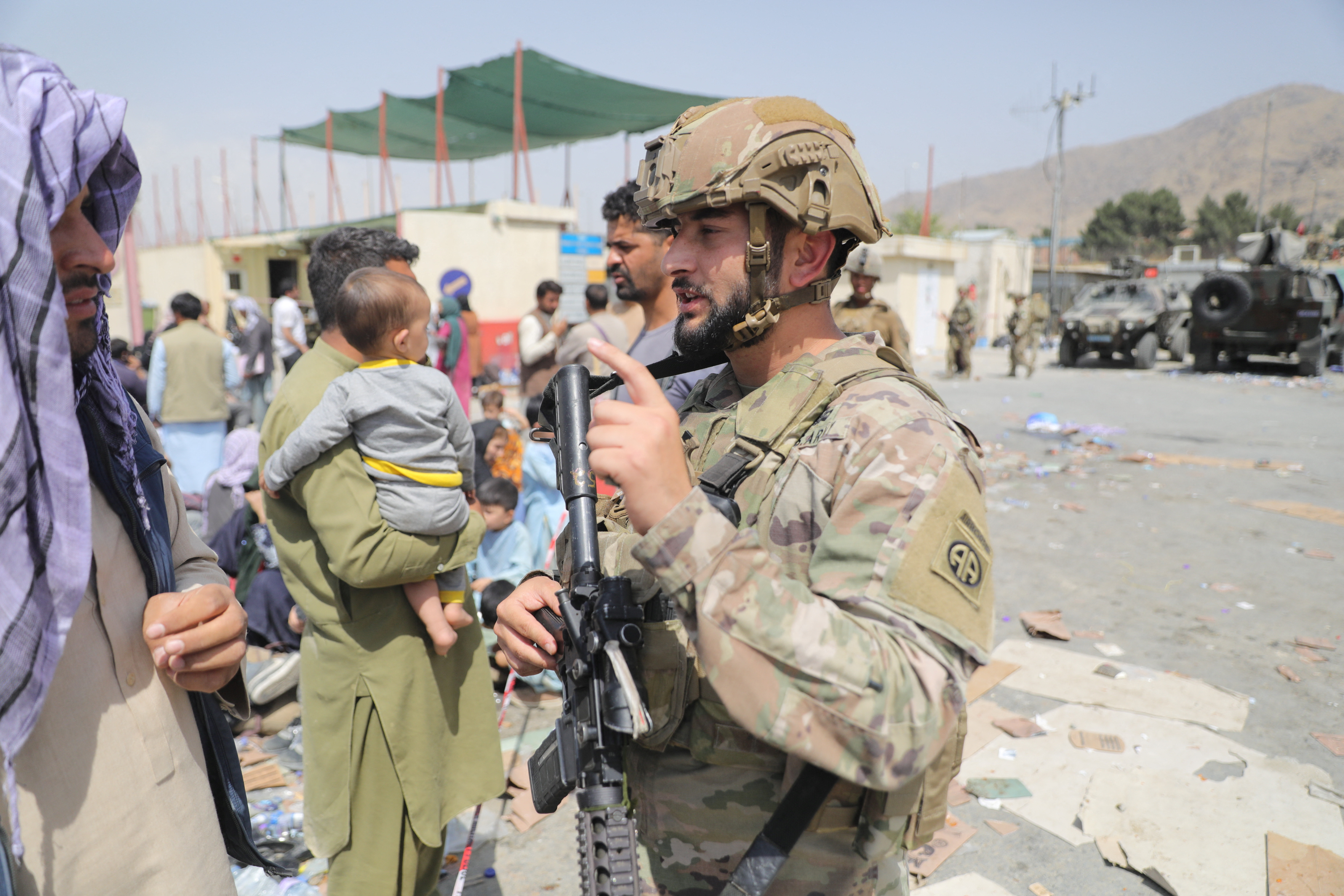 Fazel Roufi, U.S. Army, 82nd Airborne Division, keeps watch at Kabul Airport