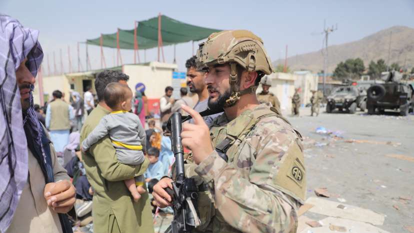 Fazel Roufi, U.S. Army, 82nd Airborne Division, keeps watch at Kabul Airport