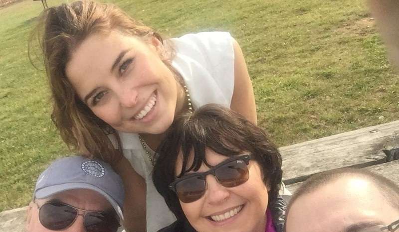 FILE PHOTO: A portrait of Ksenia Karelina with her former in-laws and ex-husband in Maryland