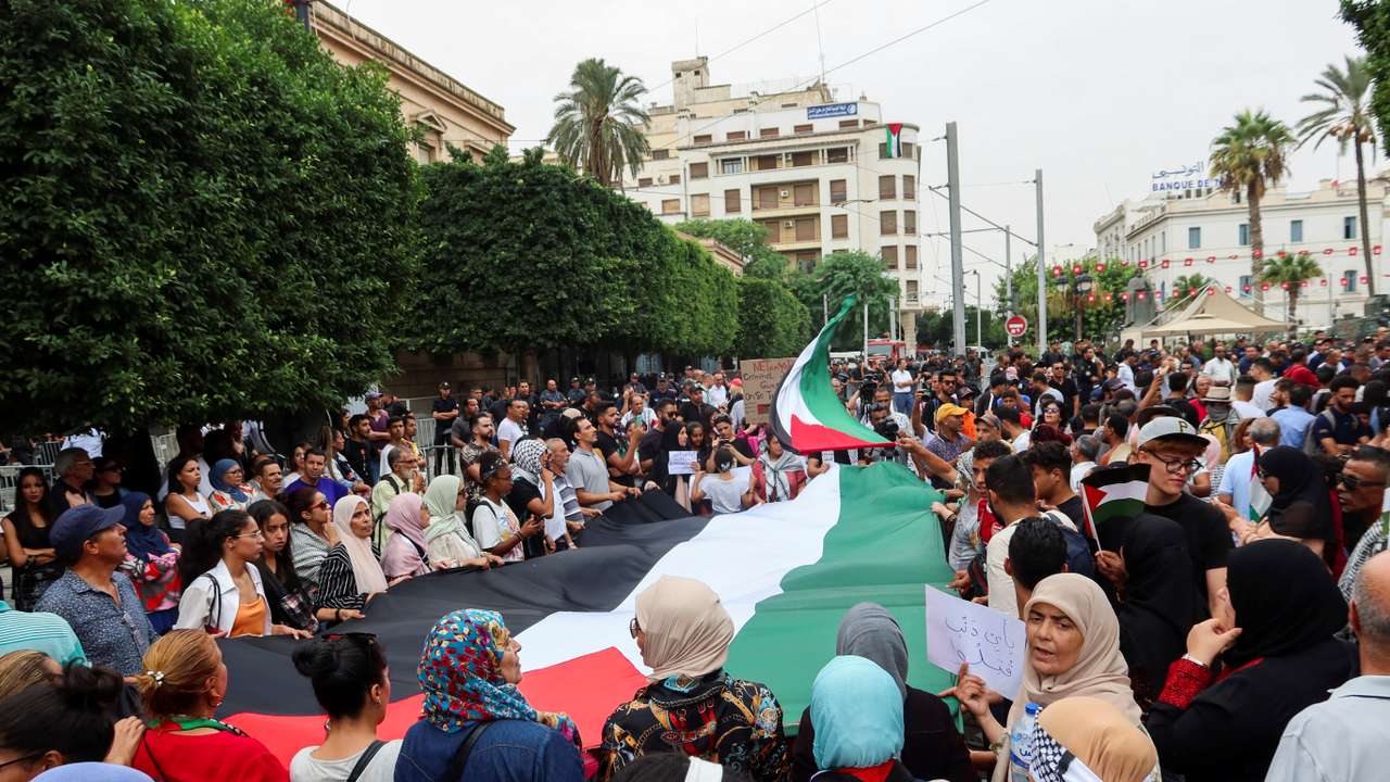Tunisians gather during a pro-Palestinian protest to express solidarity with Palestinians in Gaza, in Tunis